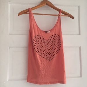 Orange shirt with black heart with beeds